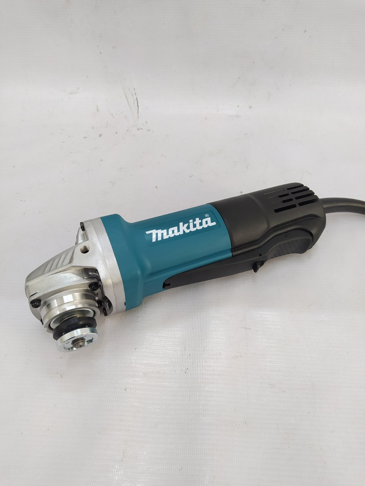 MAKITA 9556HP Angle Grinder, Paddle Switch 840W (4″)